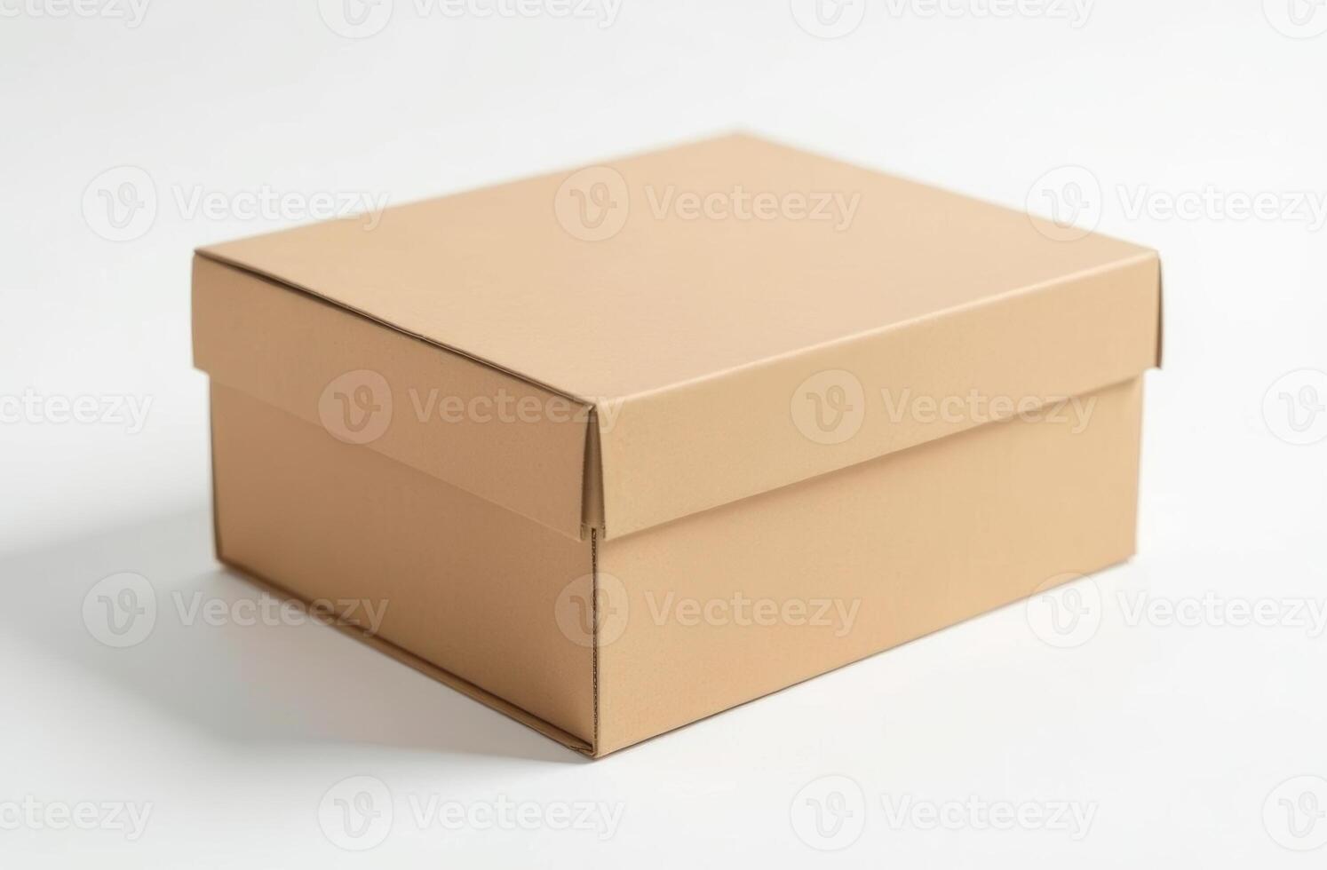 A simple brown cardboard box placed on a clean white surface, ready for storage or shipping purposes photo