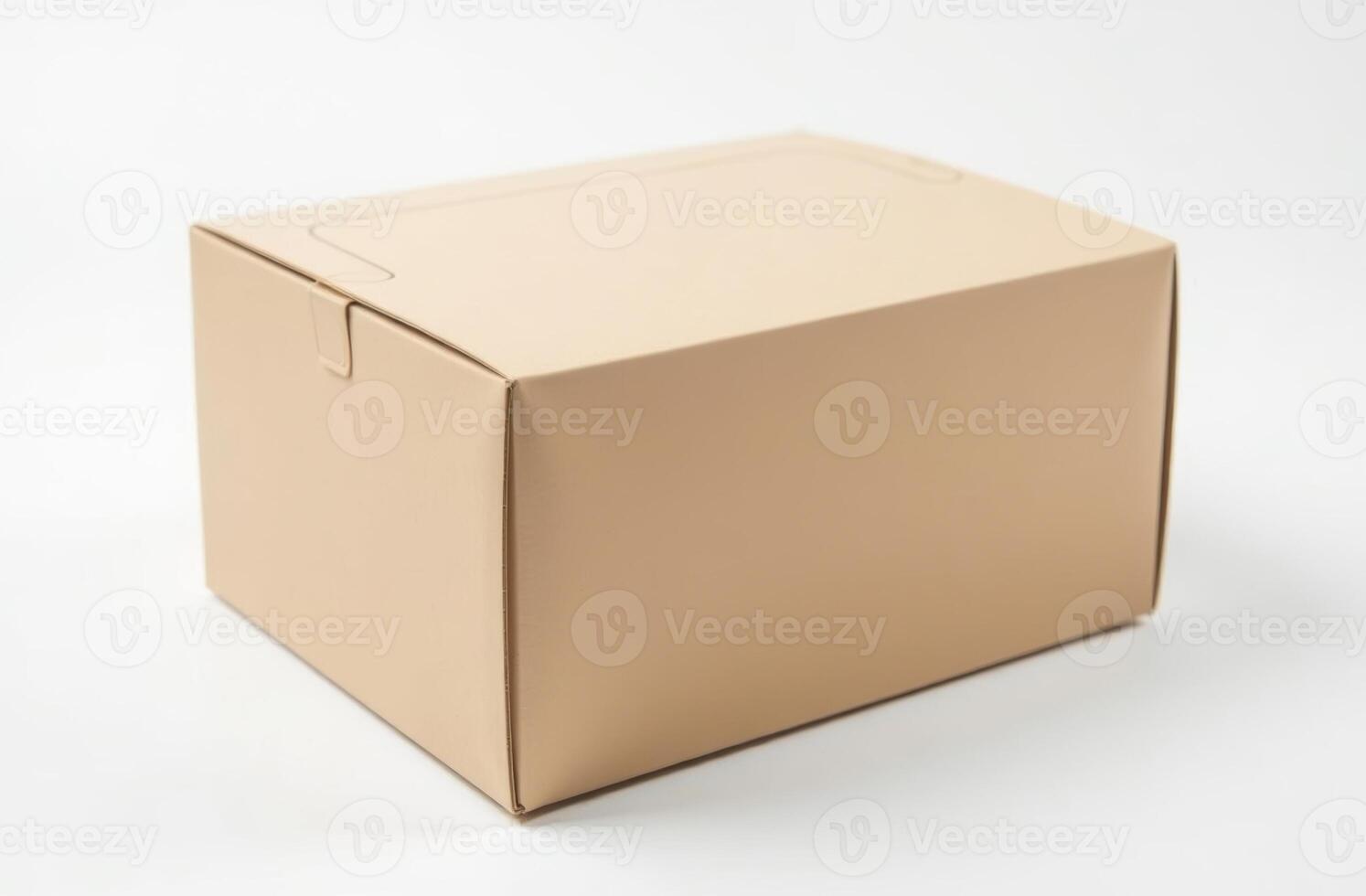 A plain cardboard box sits on a white surface, ready for packing or shipping items, demonstrating simple and functional design photo