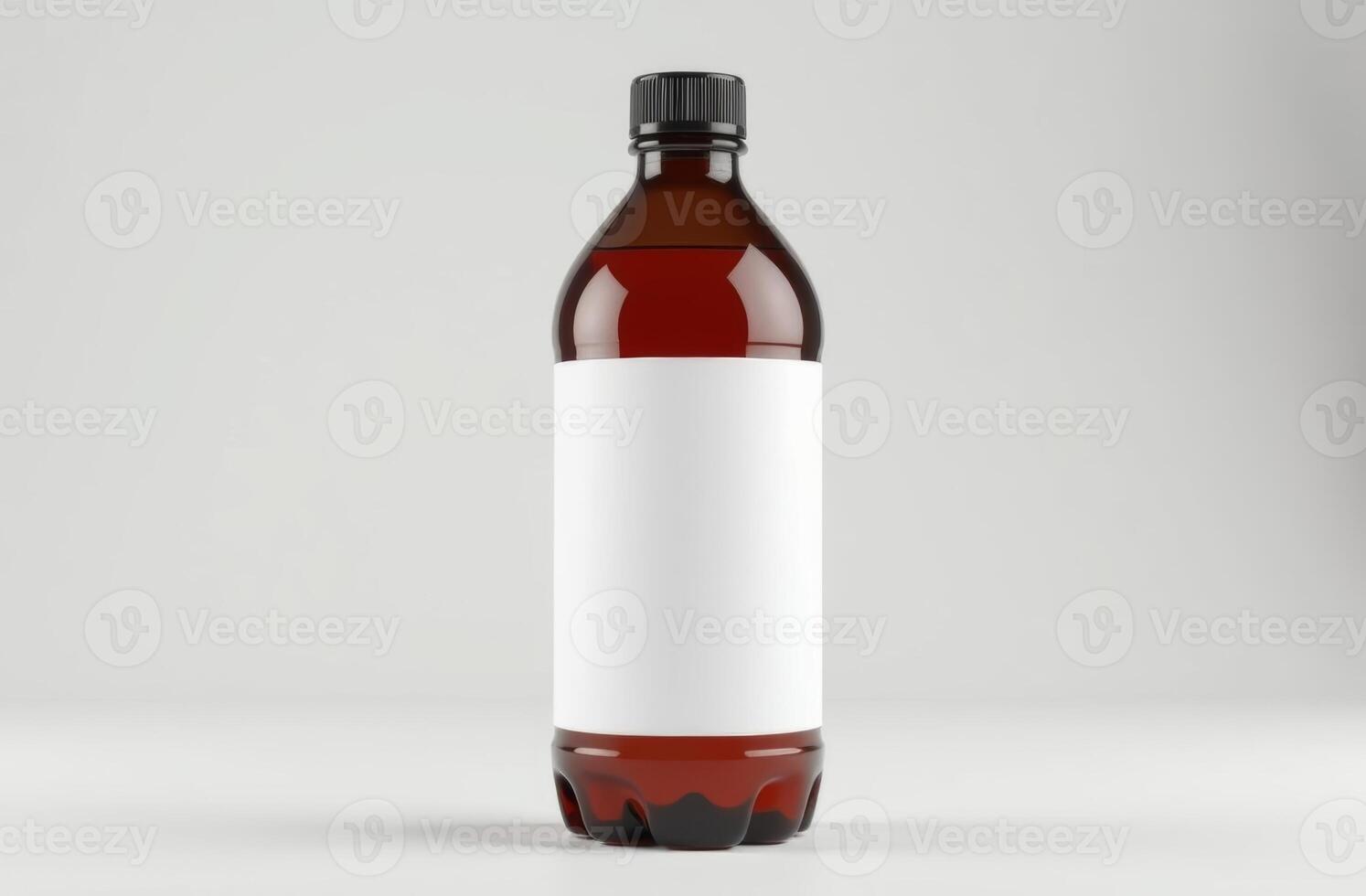 A clear amber beverage bottle with a blank label placed on a neutral background showcasing simple product presentation photo