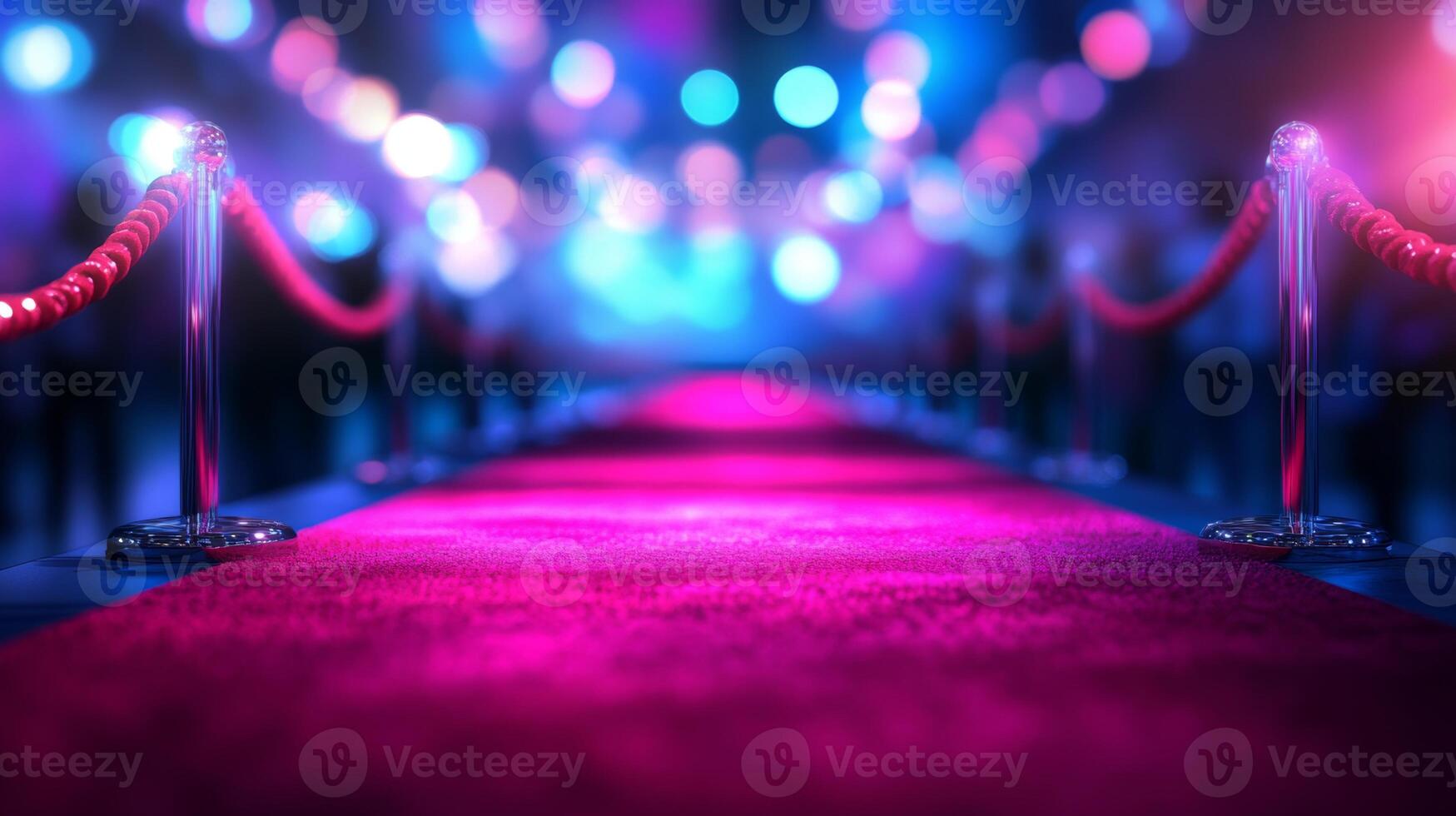 Elegant red carpet setting ahead of a glamorous event featuring colorful lights and a festive atmosphere photo