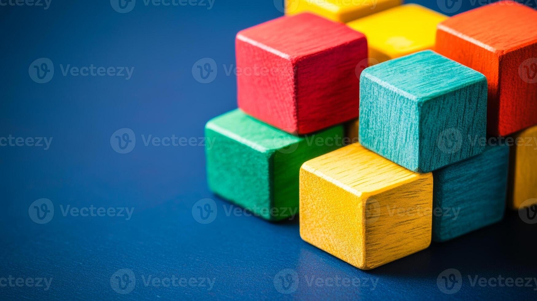 Colorful wooden blocks arranged on a blue surface showcasing creativity and playful design photo
