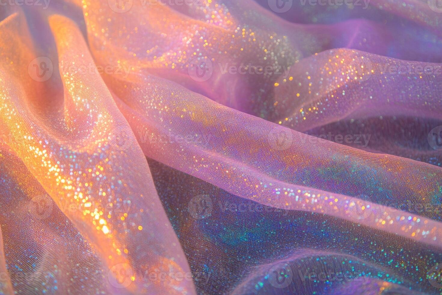 Soft shimmering fabric displaying iridescent colors under warm light in a creative artistic arrangement photo