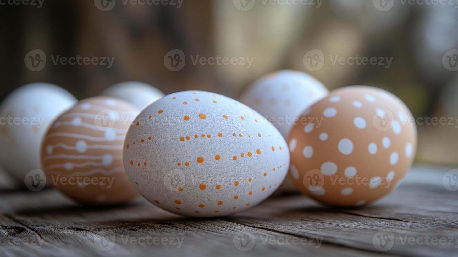 Colorful decorated eggs arranged on a wooden surface create a festive atmosphere for spring celebrations photo