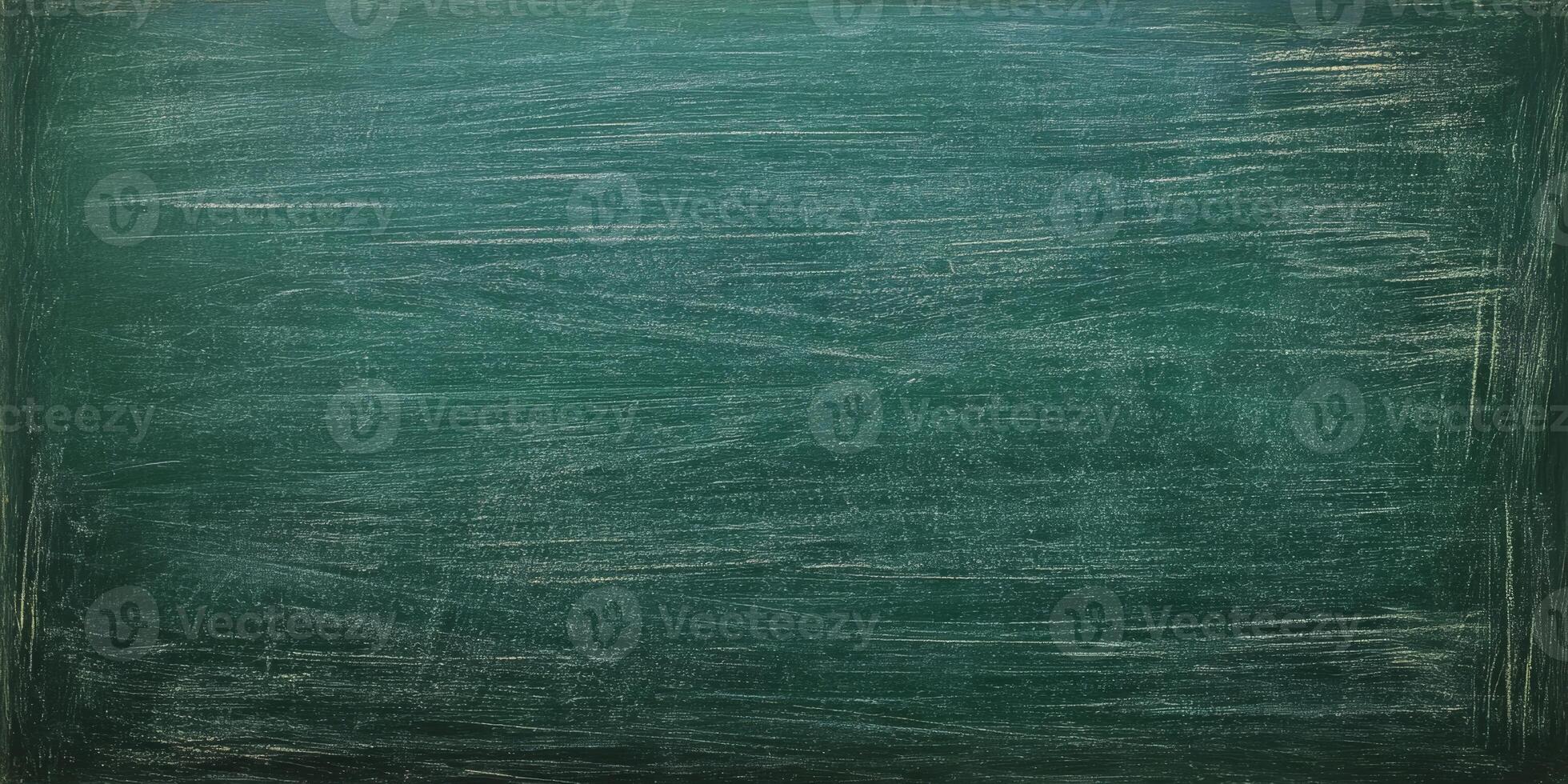 Chalkboard surface ready for lessons with faint markings and textures from previous use in a classroom setting photo