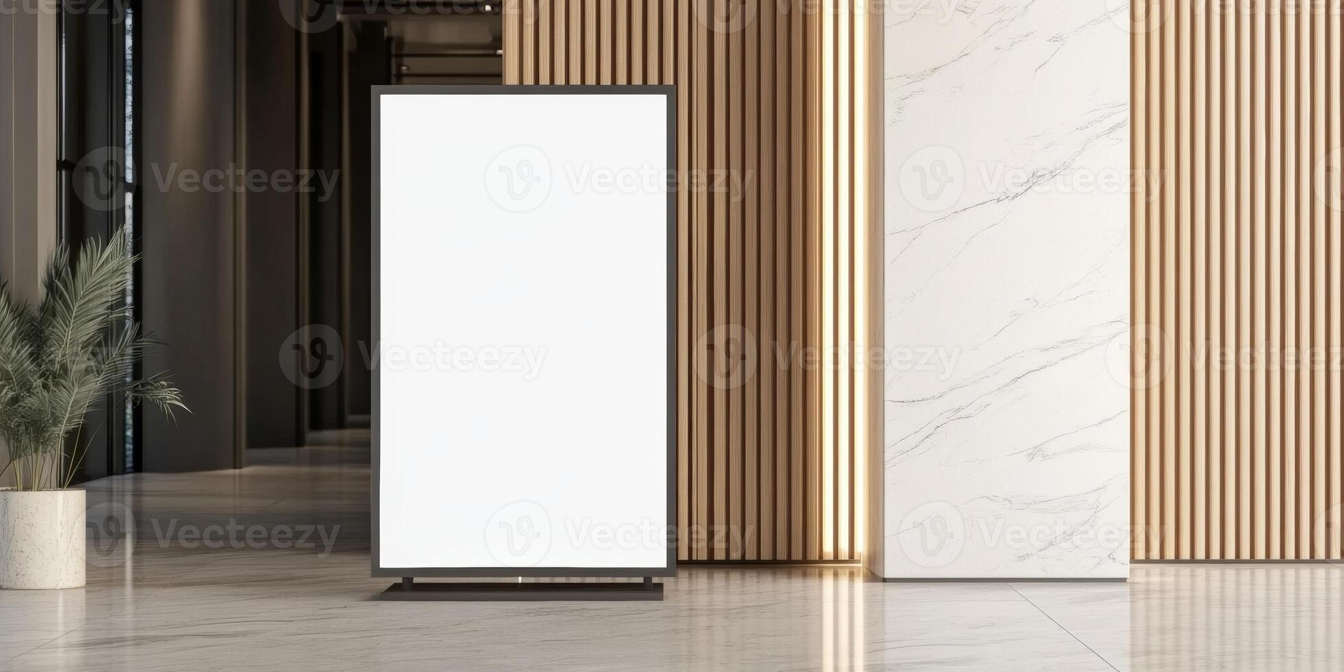 Modern indoor space featuring a blank display stand next to a stylish decorative plant at a contemporary venue photo
