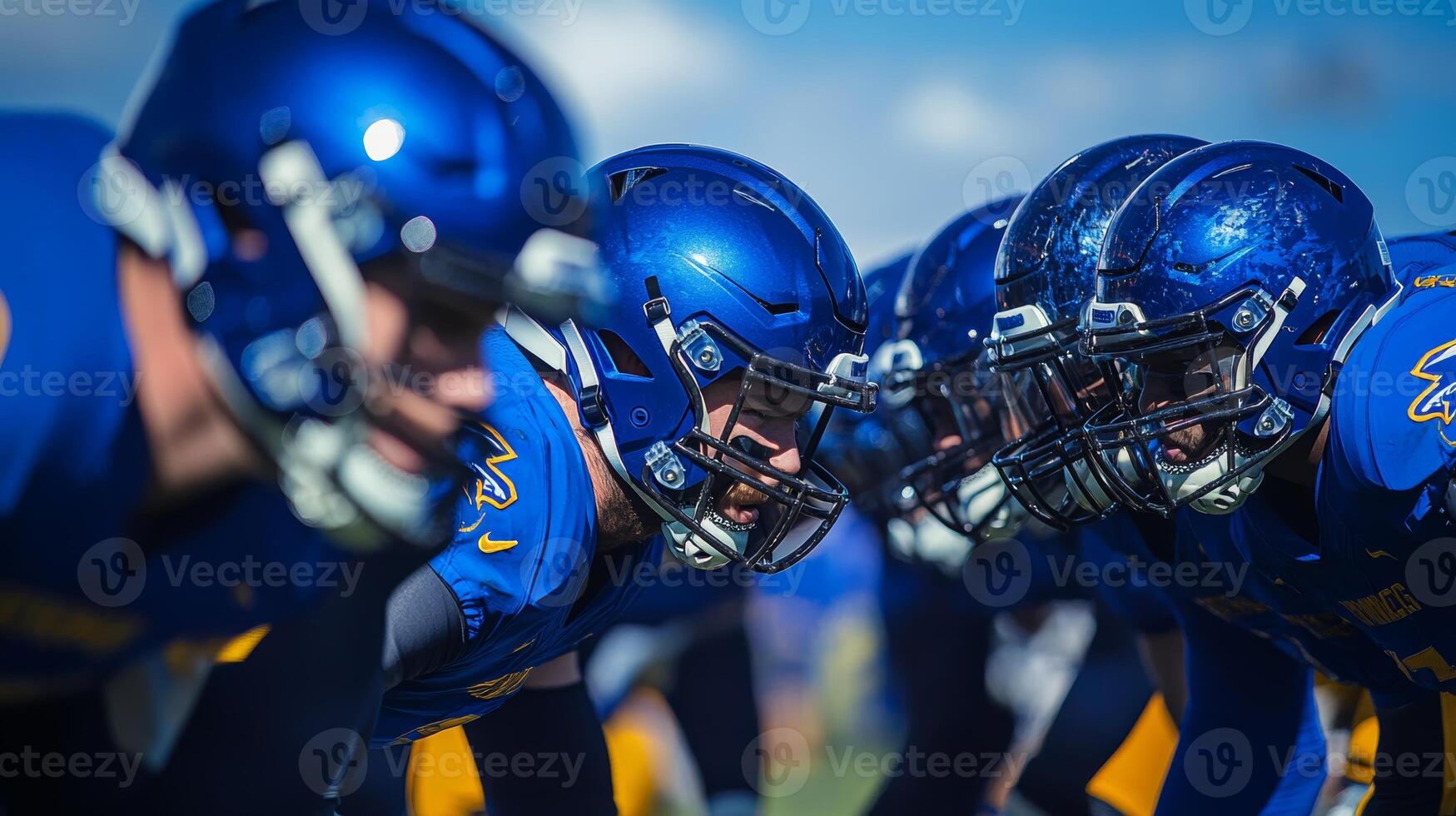 Intense football practice on a sunny day with players focused on teamwork and strategy photo