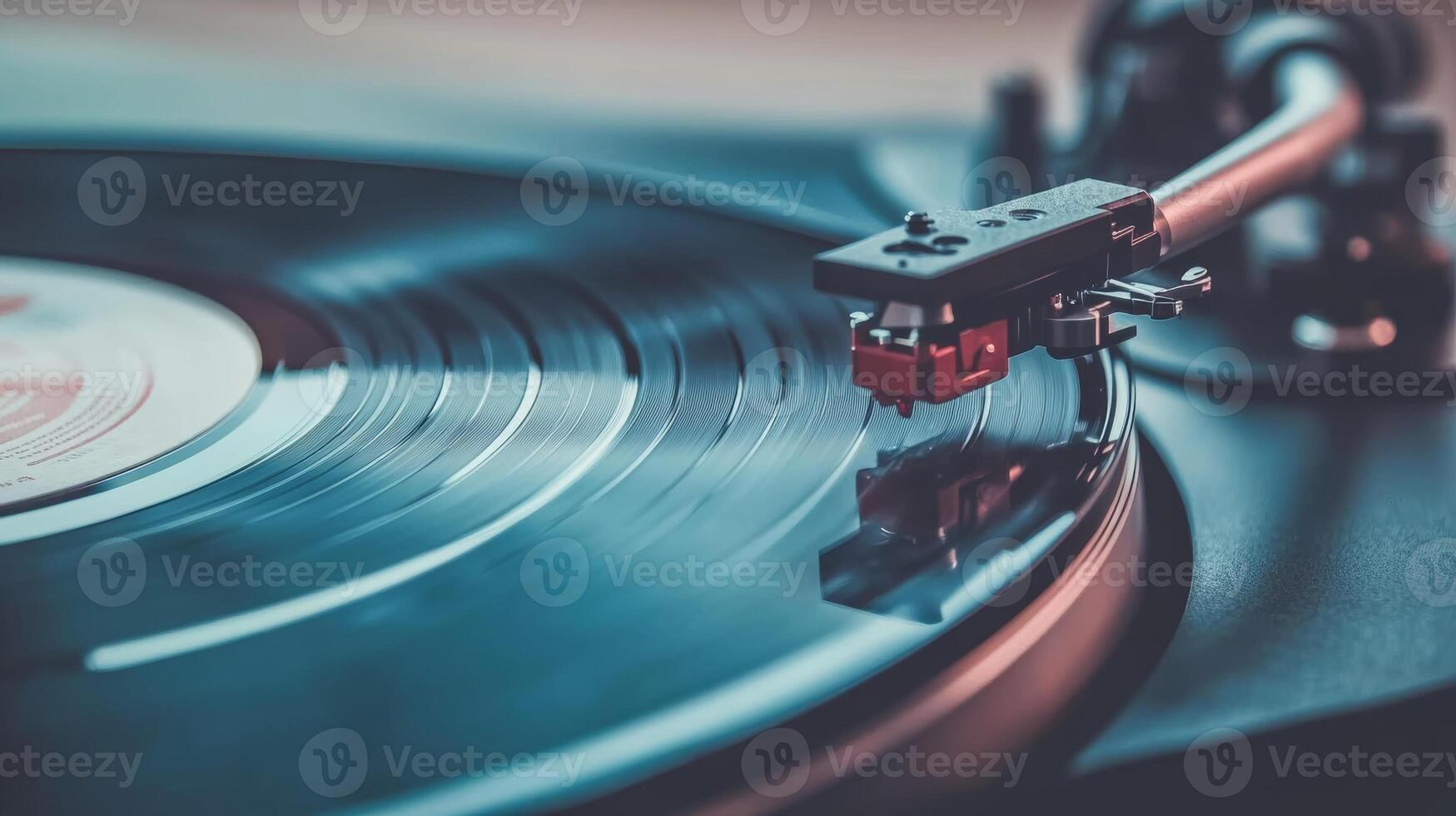 Vinyl record playing on a turntable in a cozy room filled with soft lighting and a relaxing ambiance photo