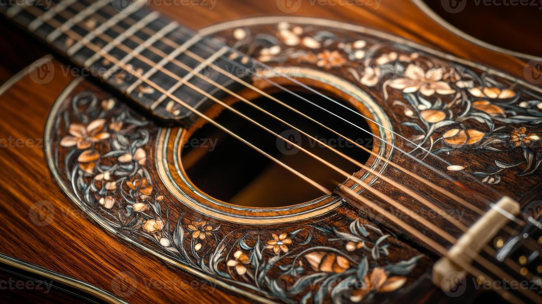 Intricate floral design on a vintage acoustic guitar captured with detailed craftsmanship in a warm, soft light photo