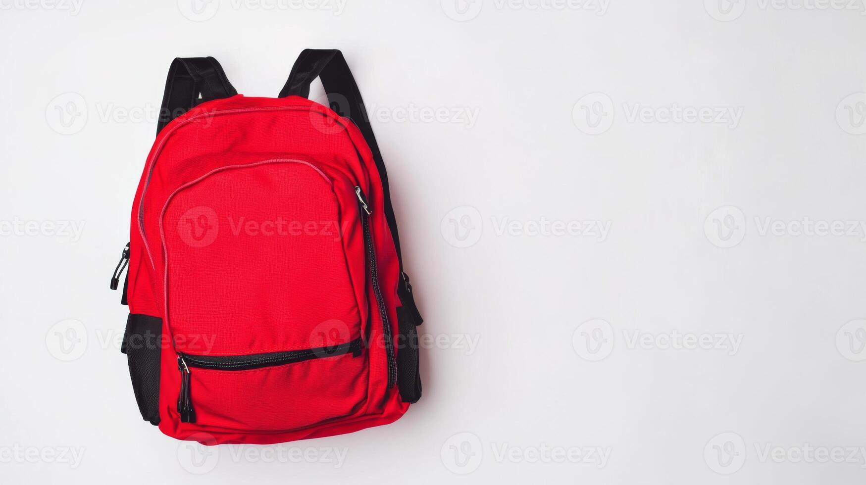 Backpack displayed on a neutral background showcasing vibrant red color and practical design for everyday use photo