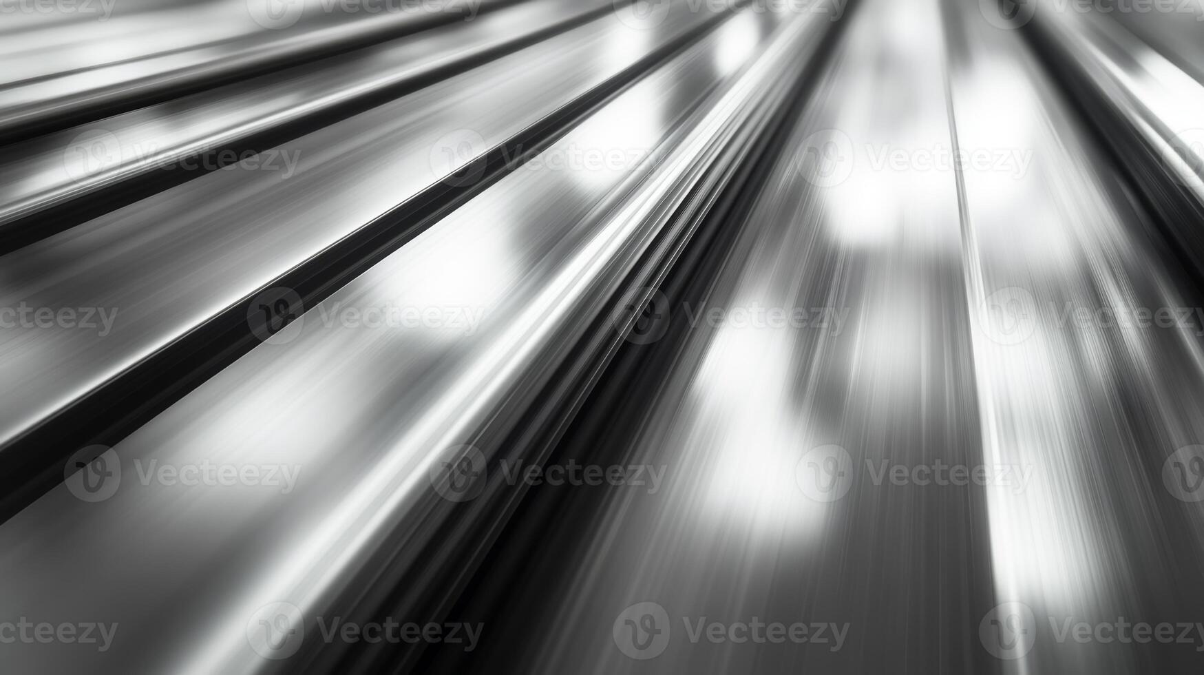 Close-up view of shiny metallic surface reflecting light with dynamic lines in an abstract composition photo