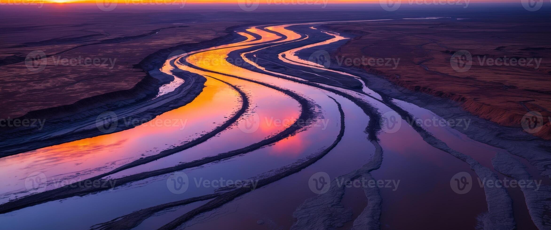 Winding River at Sunset. A Stunning Aerial View of Reflections and Natural Beauty. photo