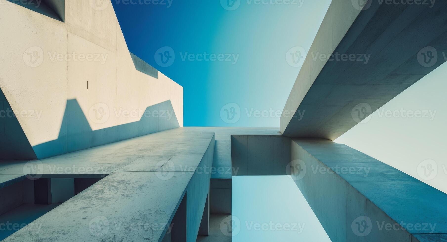 Architectural Concrete Structure Under Clear Blue Sky Minimalist Perspective View photo