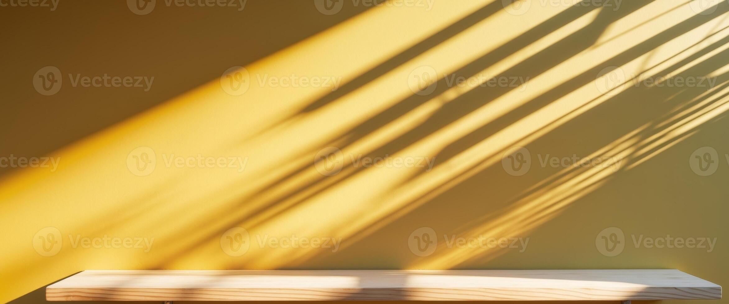 Minimalist Yellow Wall with Shelf and Shadow Patterns Perfect for Product Placement. photo
