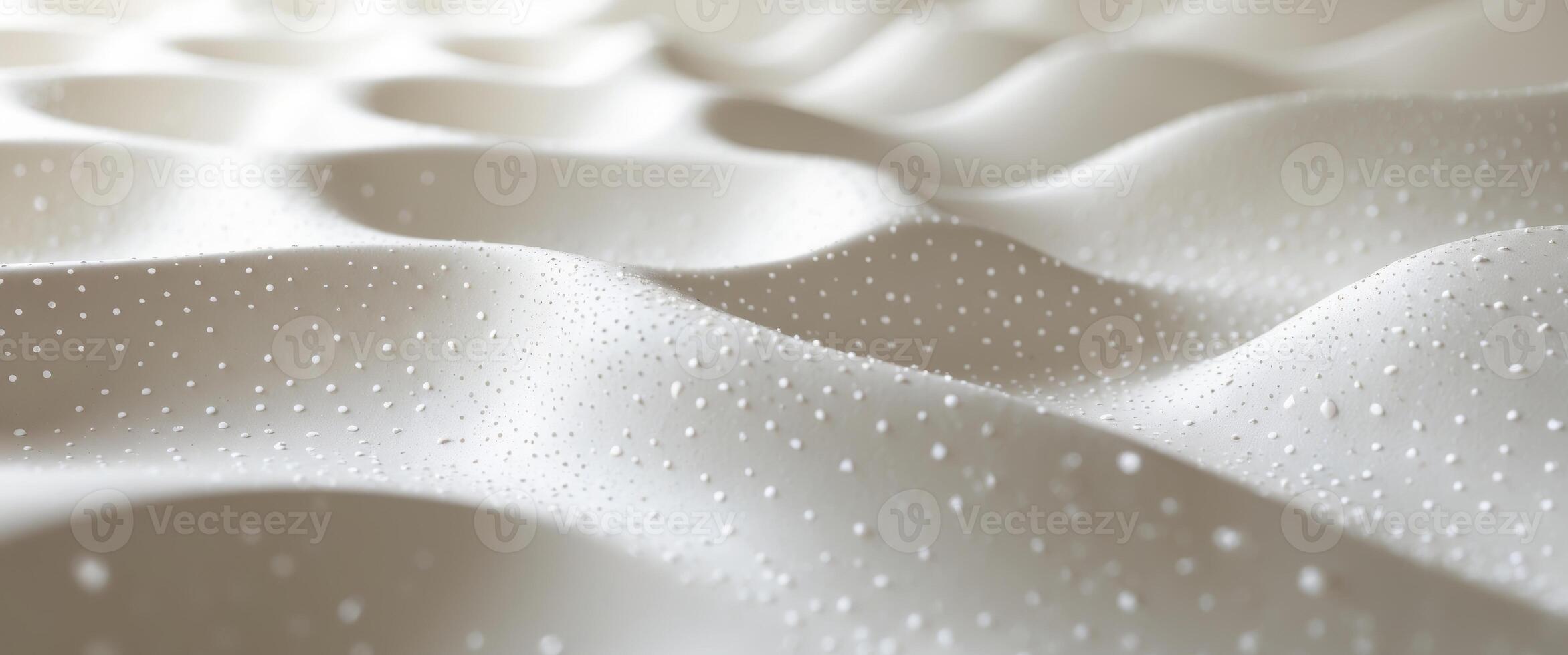 A close up of a white sheet with water droplets photo