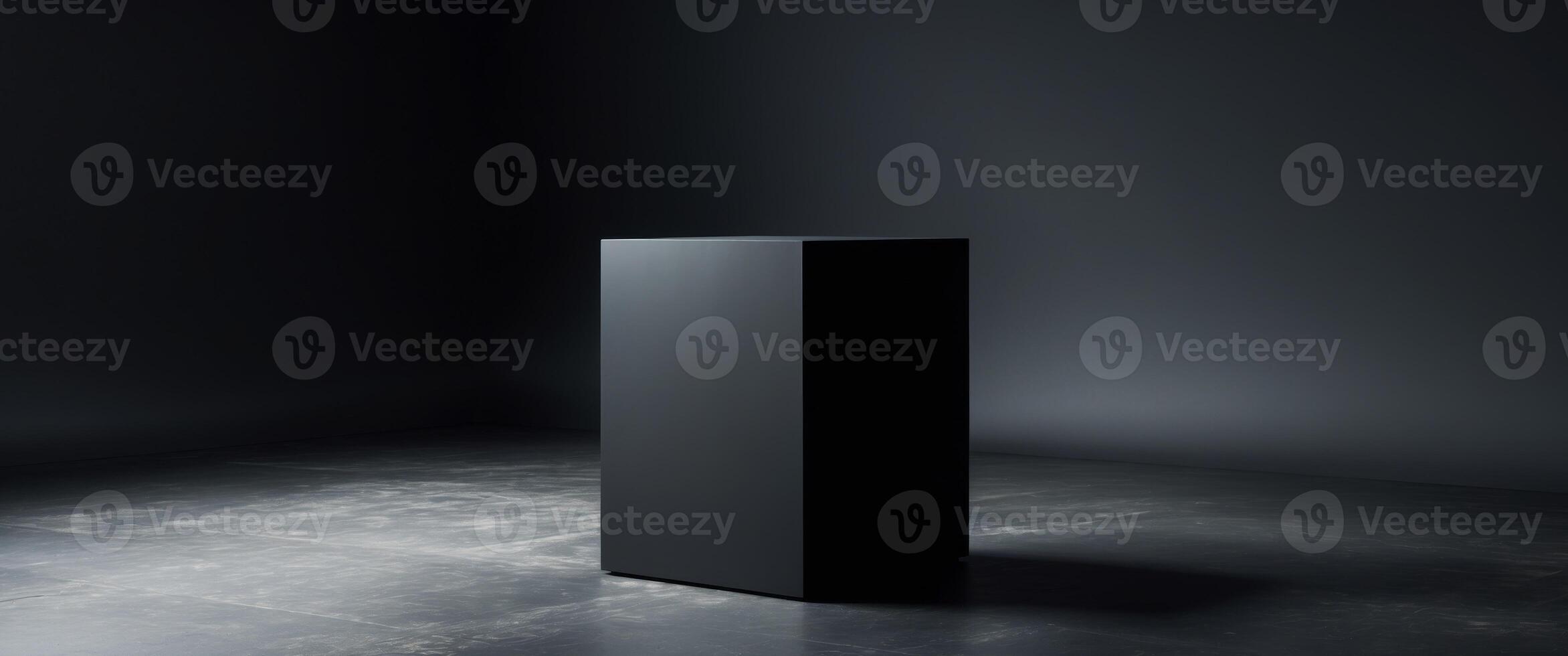 A black square box sitting on a floor photo