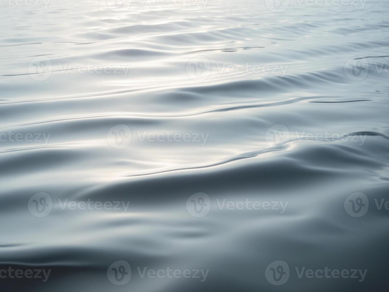 A close up of water ripples on the surface of the ocean photo