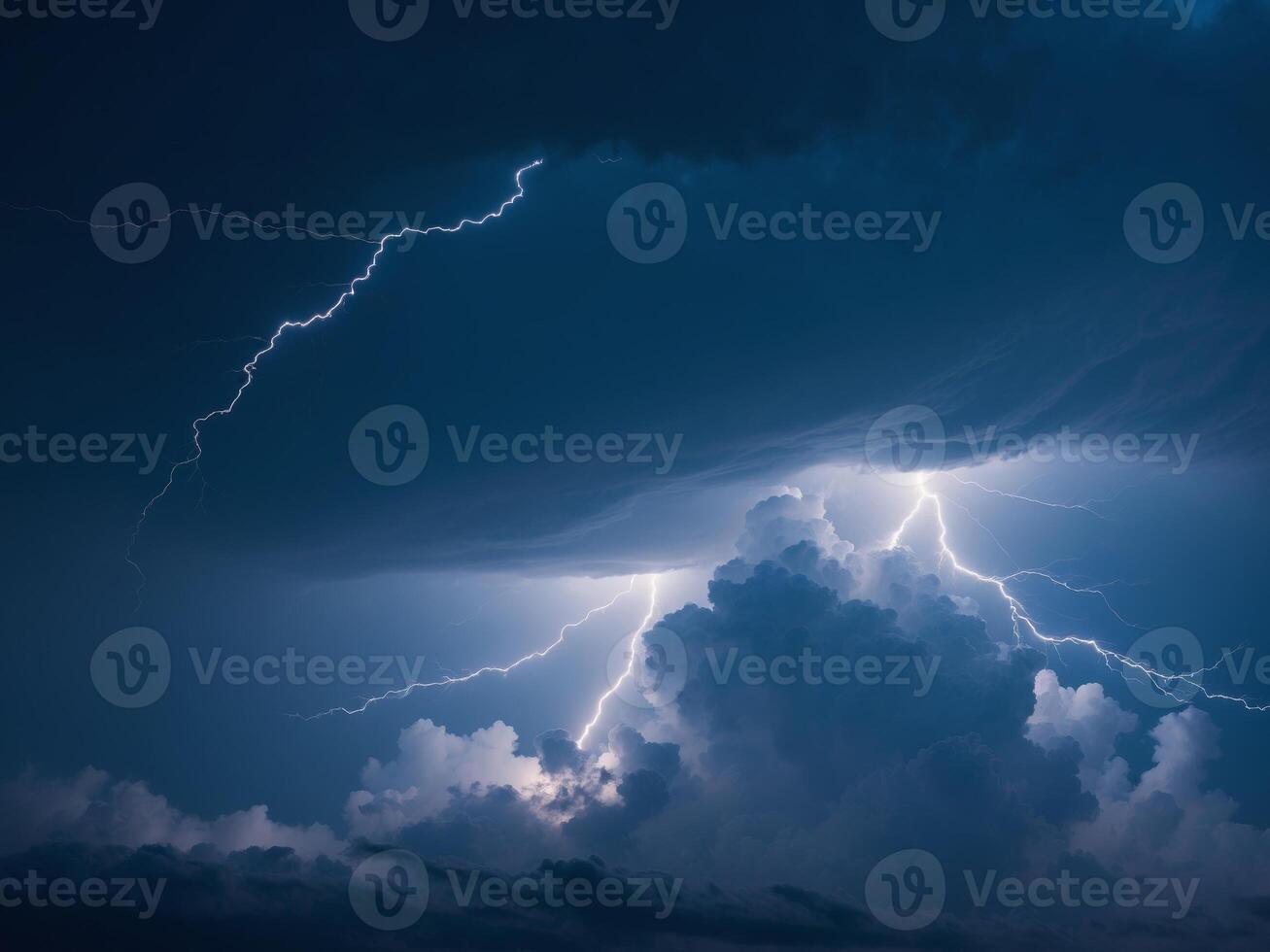 Lightning strikes over a cloud with dark clouds in the background photo