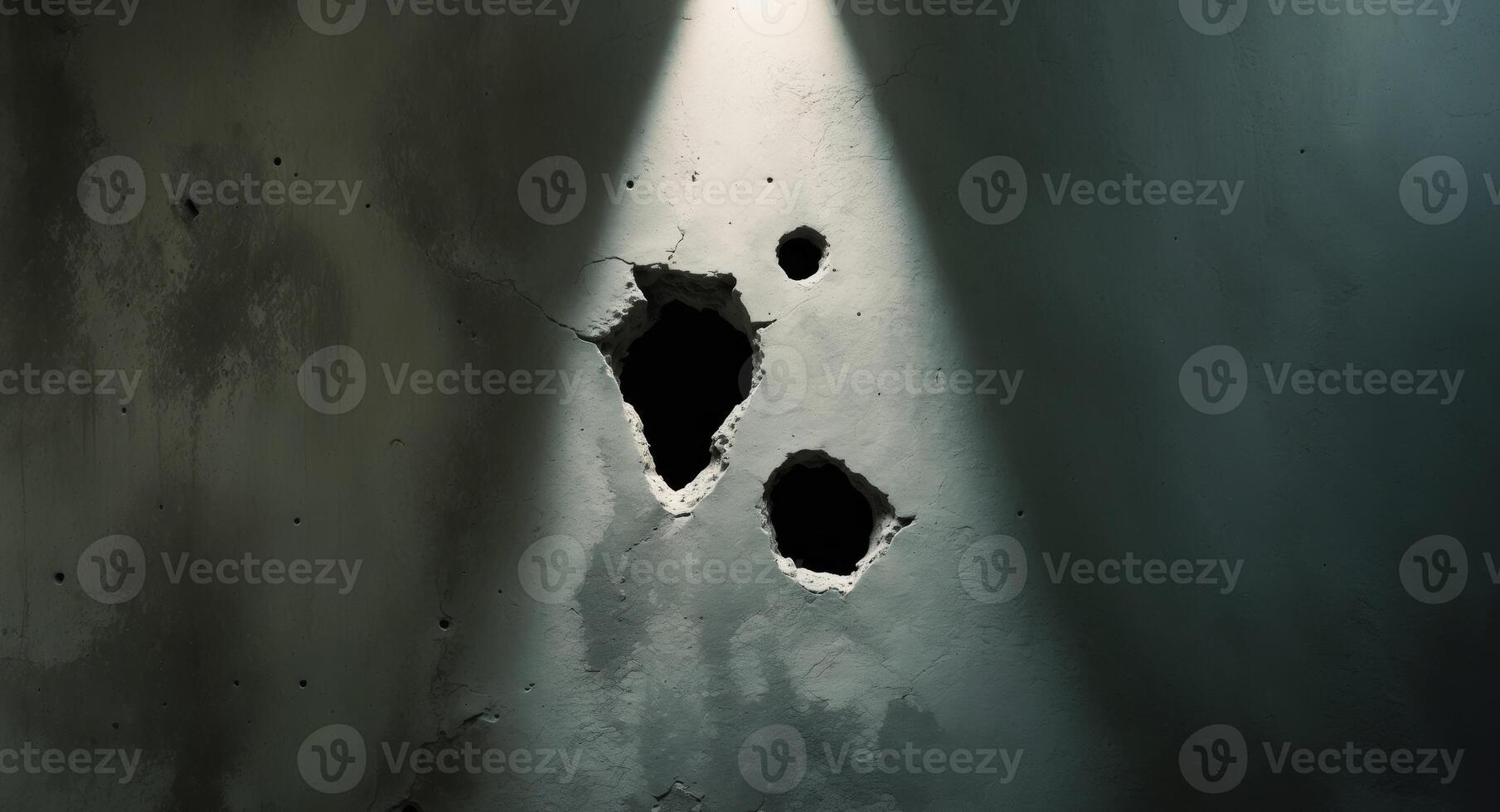 A hole in a wall with a light shining through it photo