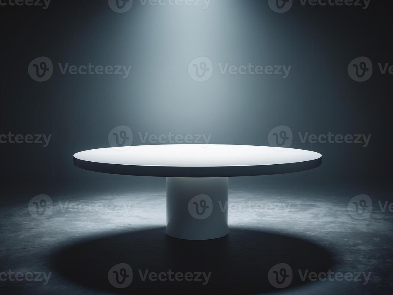 Round table with spotlight on it in dark room photo
