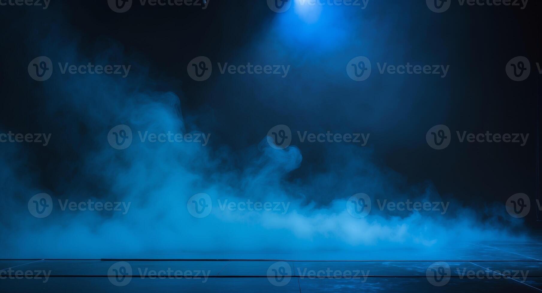 Moody Blue. A Cinematic Stage Illuminated by Blue Spotlight and Dense, Ambient Fog. photo