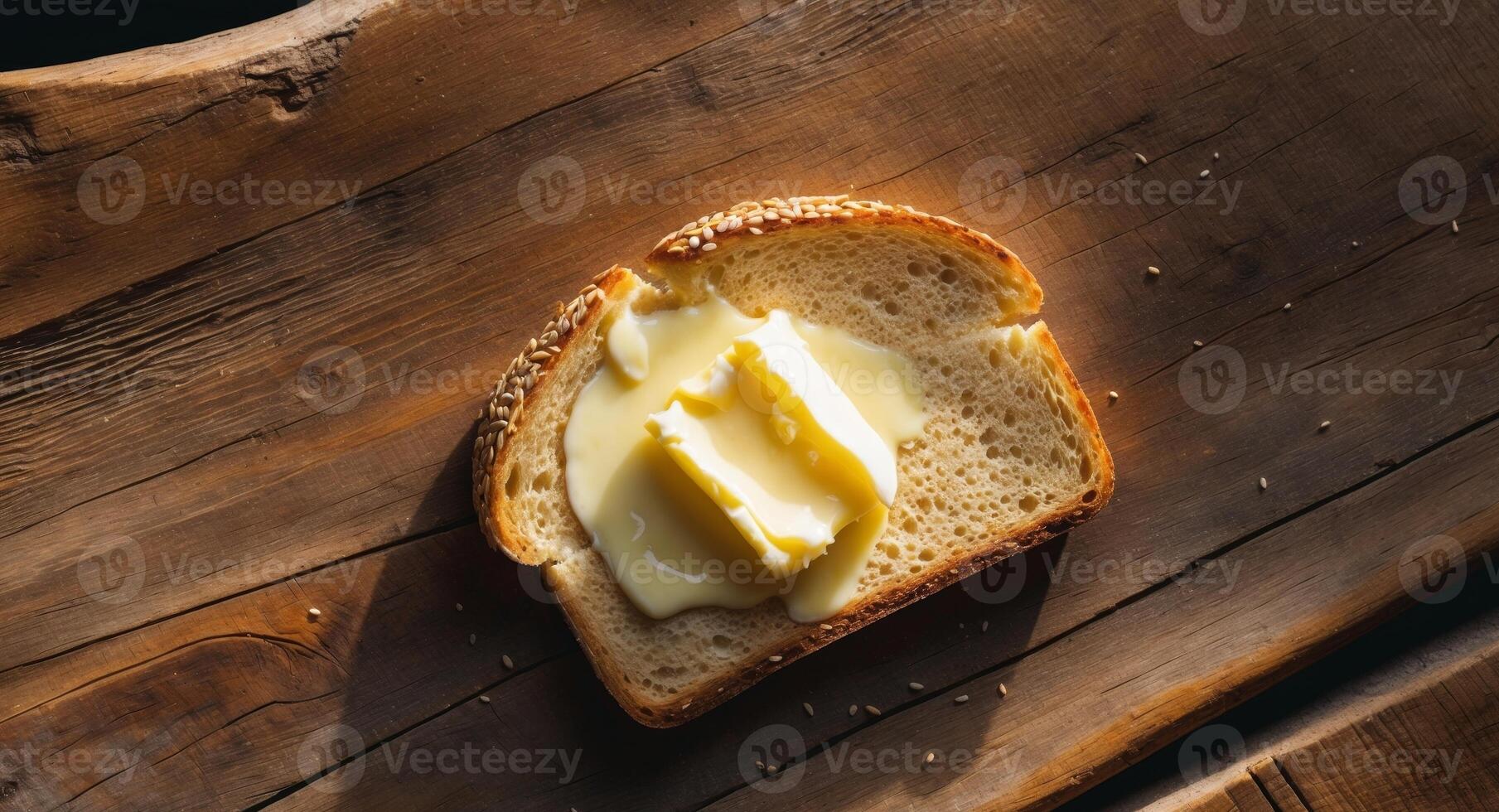 A piece of bread with butter on top photo