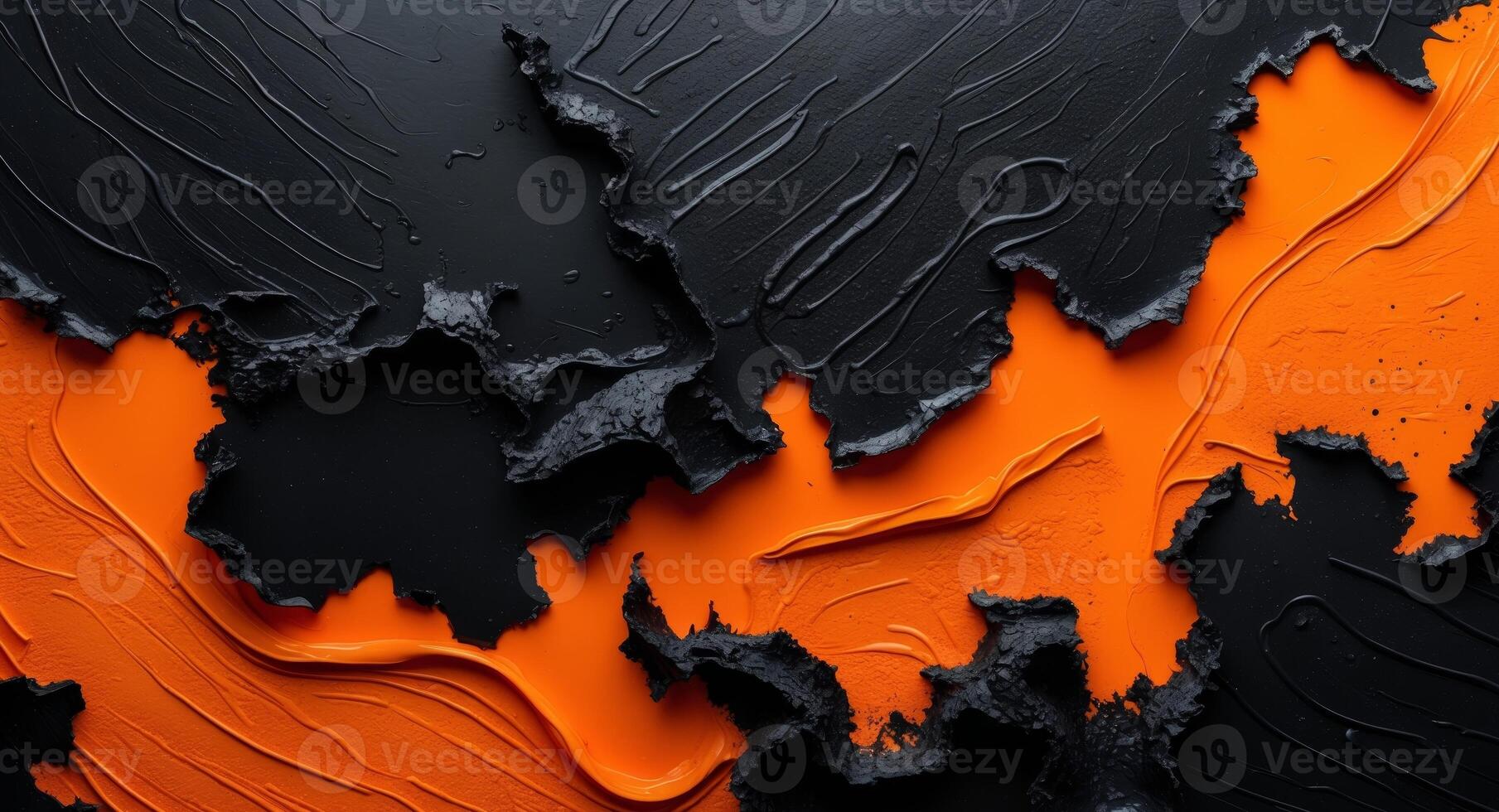 A black and orange paint splattered on a wall photo