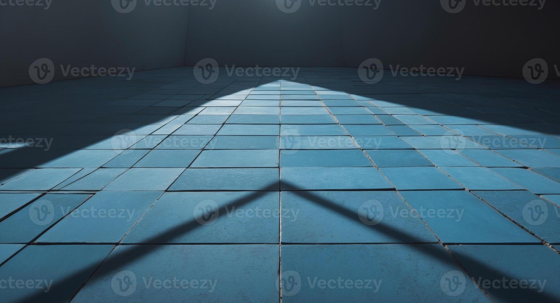 A blue tiled floor with a light shining through it photo