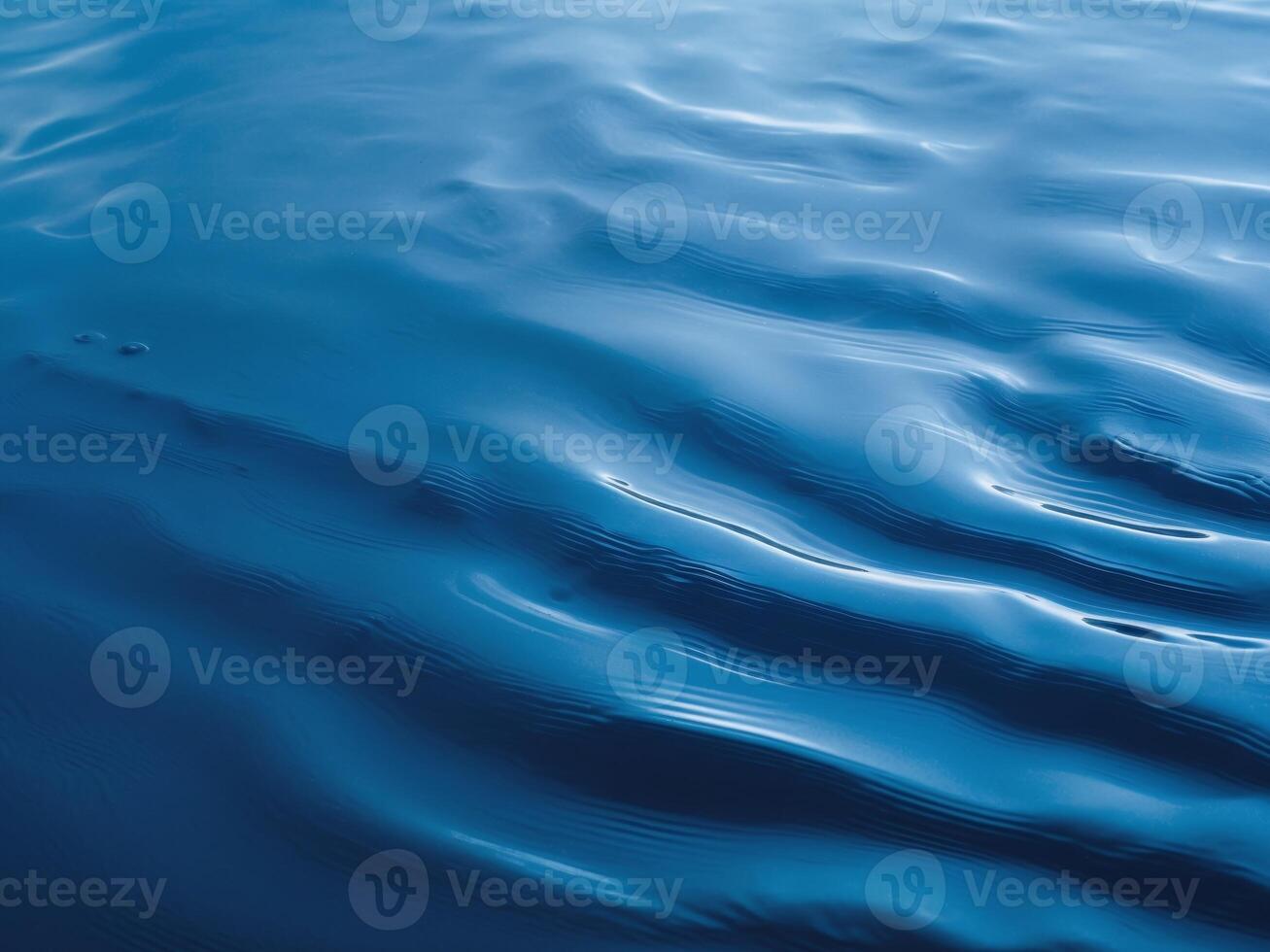 Mesmerizing Blue Water Surface. Abstract Ripples, Reflections, and Gentle Movement. photo