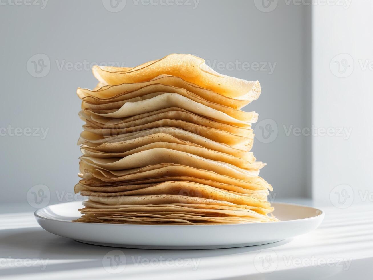 Stack of pancakes on a plate photo