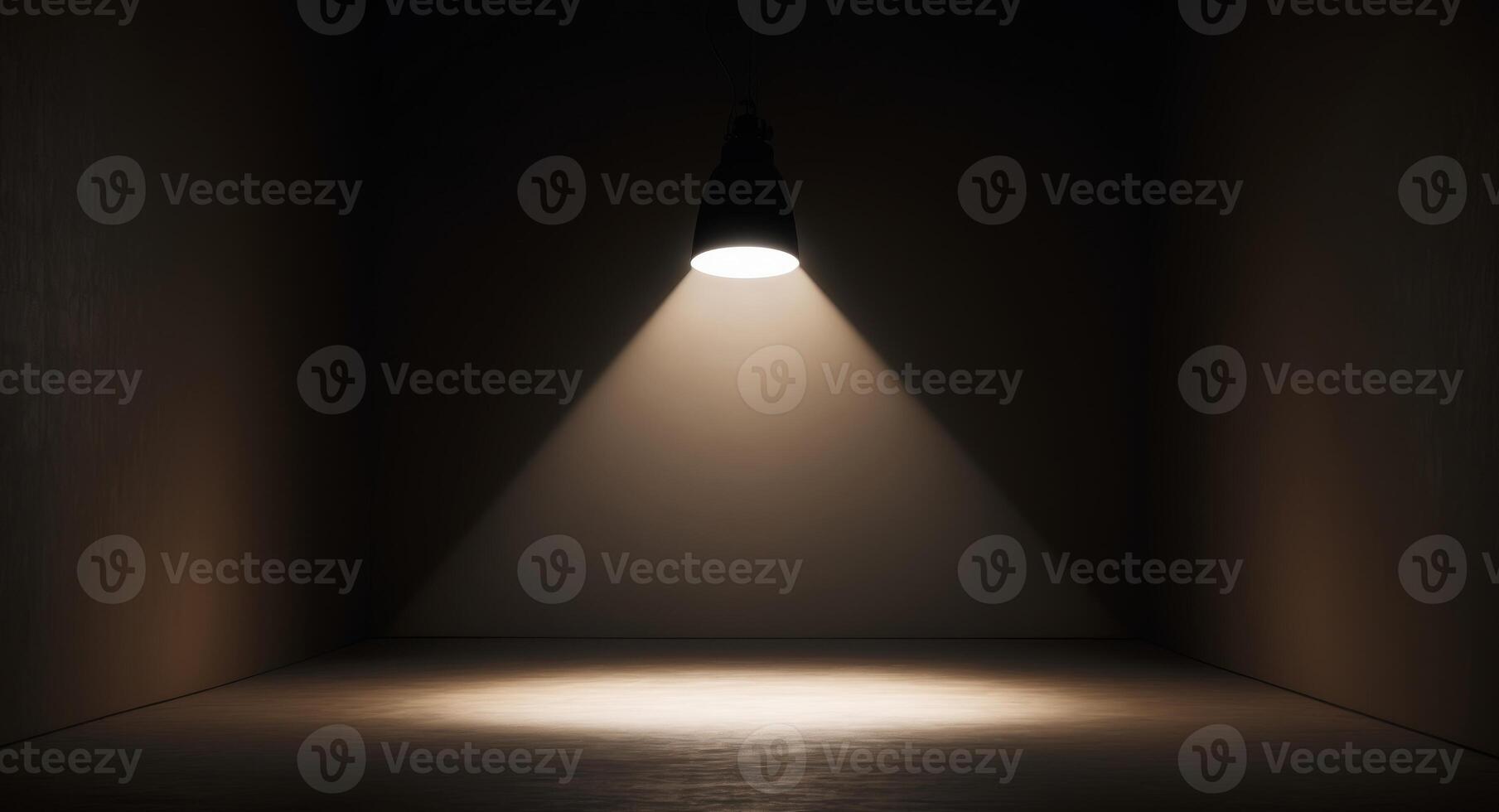 A dark room with a light shining from the ceiling photo
