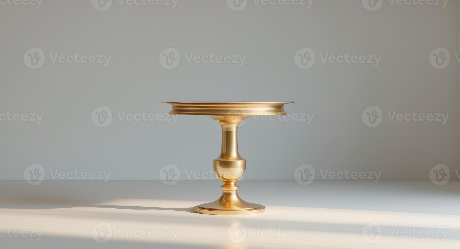 Elegant Golden Pedestal Table for Product Display, Minimalist Studio Setting photo