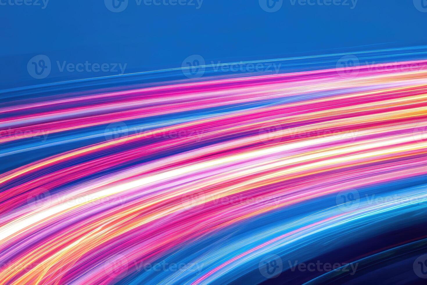 Abstract light trails on a blue background photo