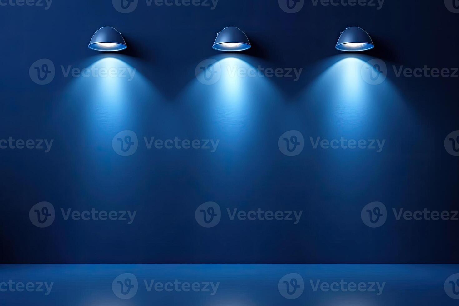 Three blue lights on a wall in front of a blue wall photo