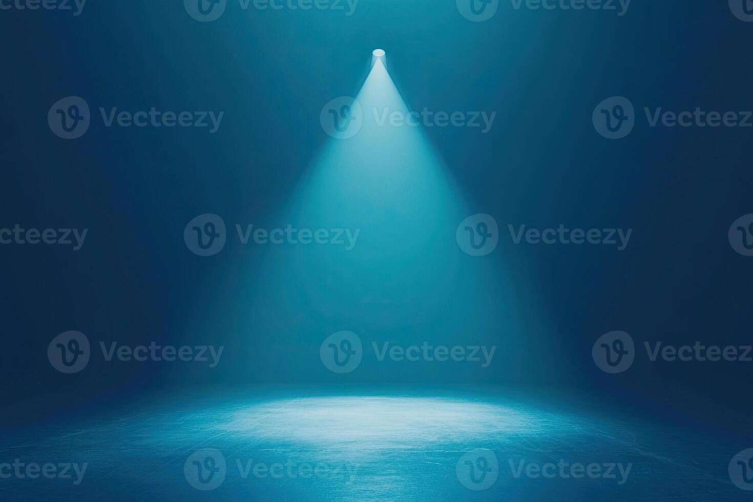 An empty room with a spotlight shining down on it photo