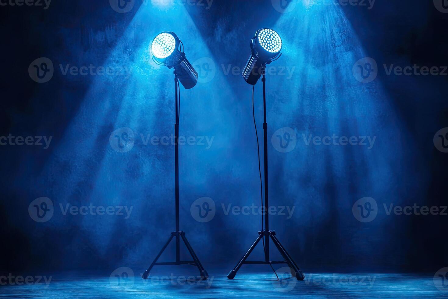 Two spotlight lights on a stage photo