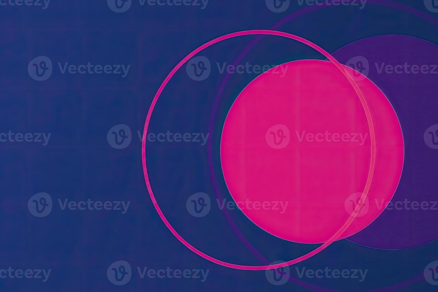 A blue and pink circle with a pink dot in the center photo