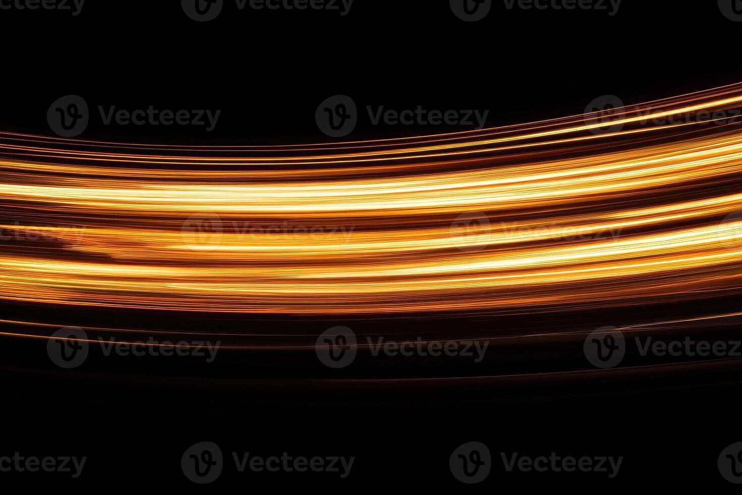 A long exposure photograph of a car driving at night photo
