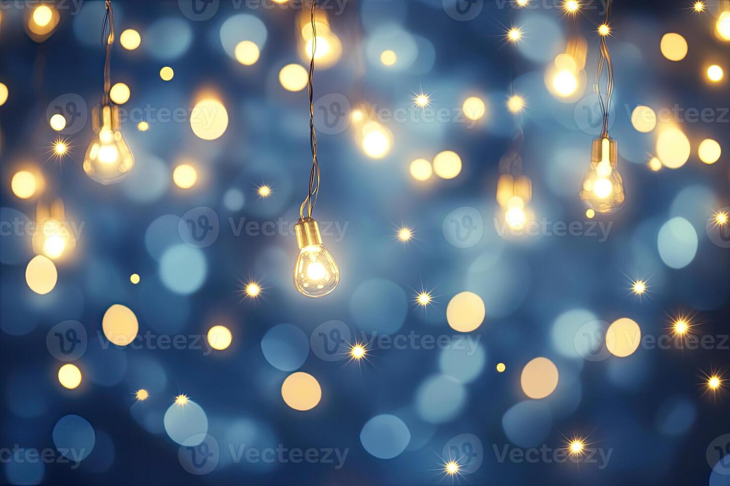 A string of light bulbs hanging from a wire photo