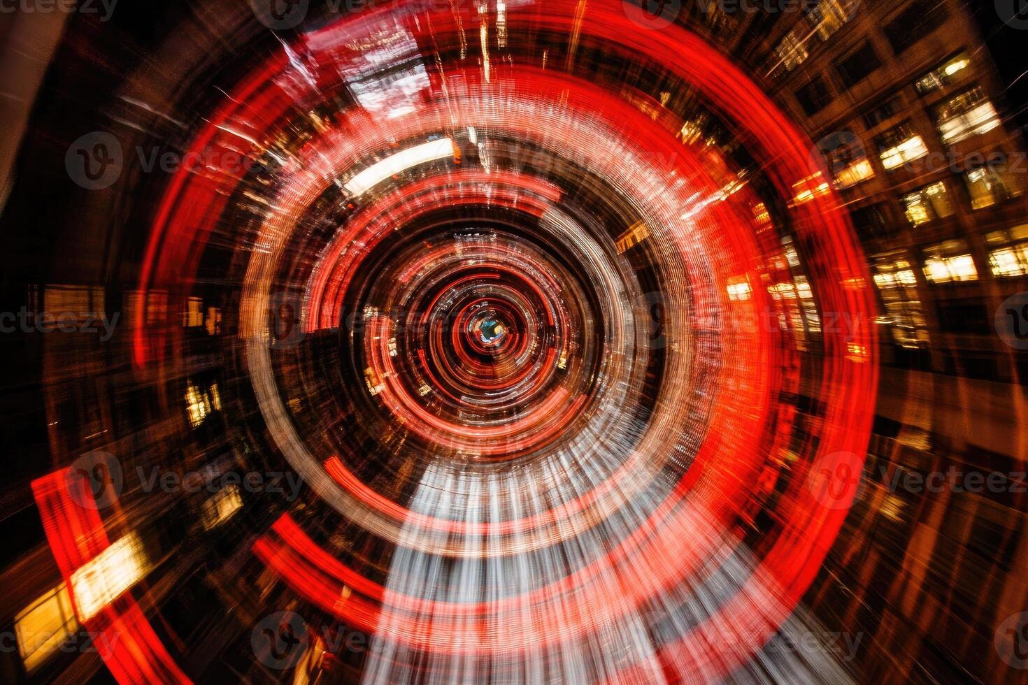 A blurry image of a red light in a city photo