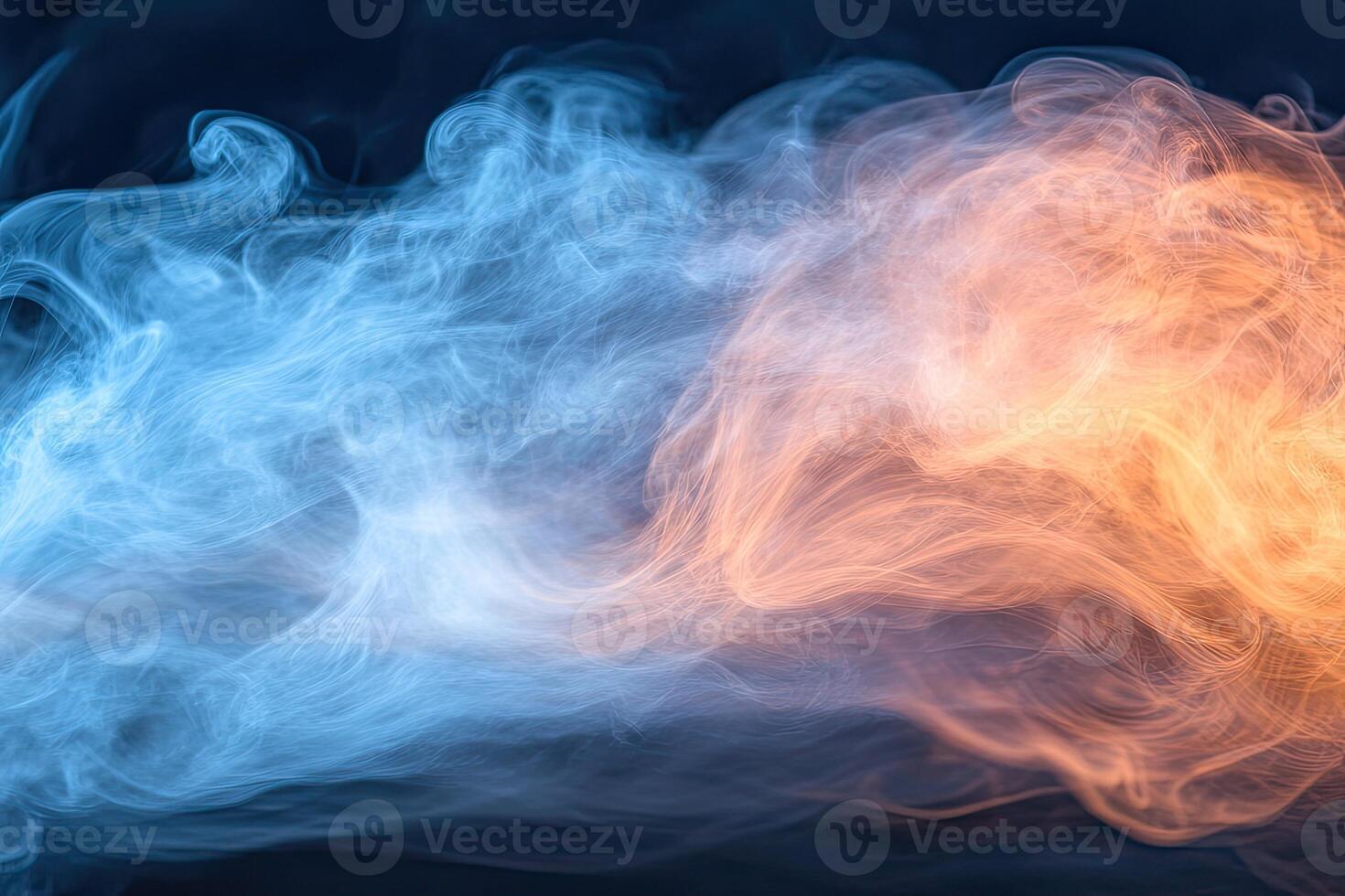 Blue and orange smoke on a black background photo
