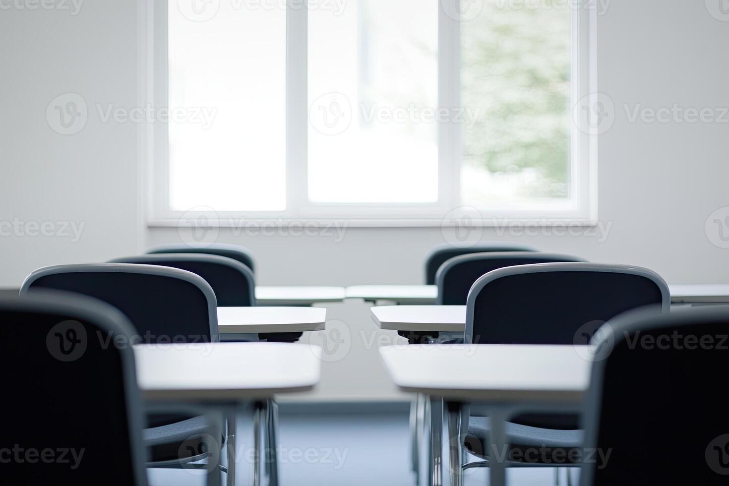 Empty classroom with black chairs and white window photo