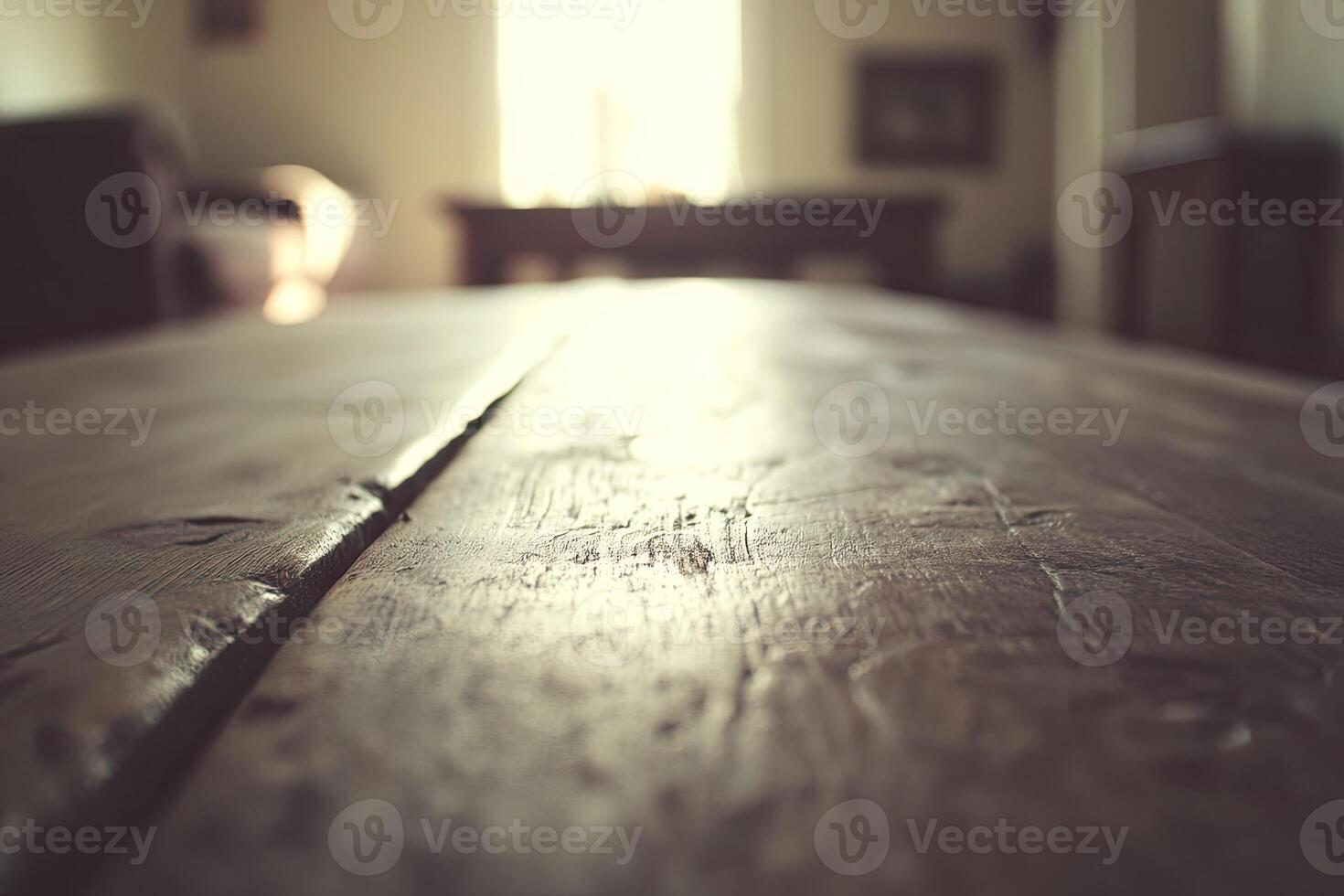 A wooden table with a light shining on it photo