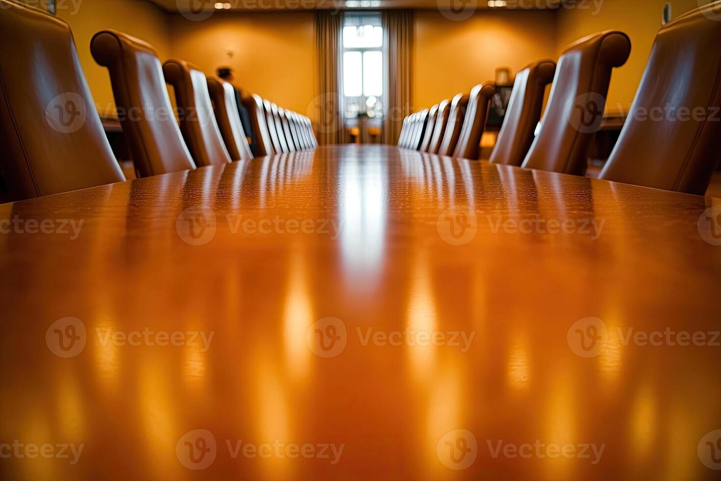 A long table with chairs in a room photo
