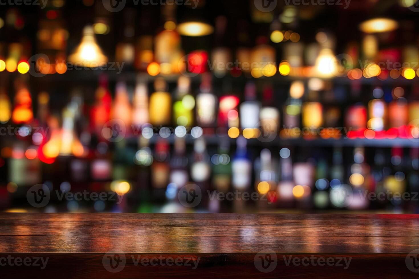Bar counter with blurred bottles and lights photo