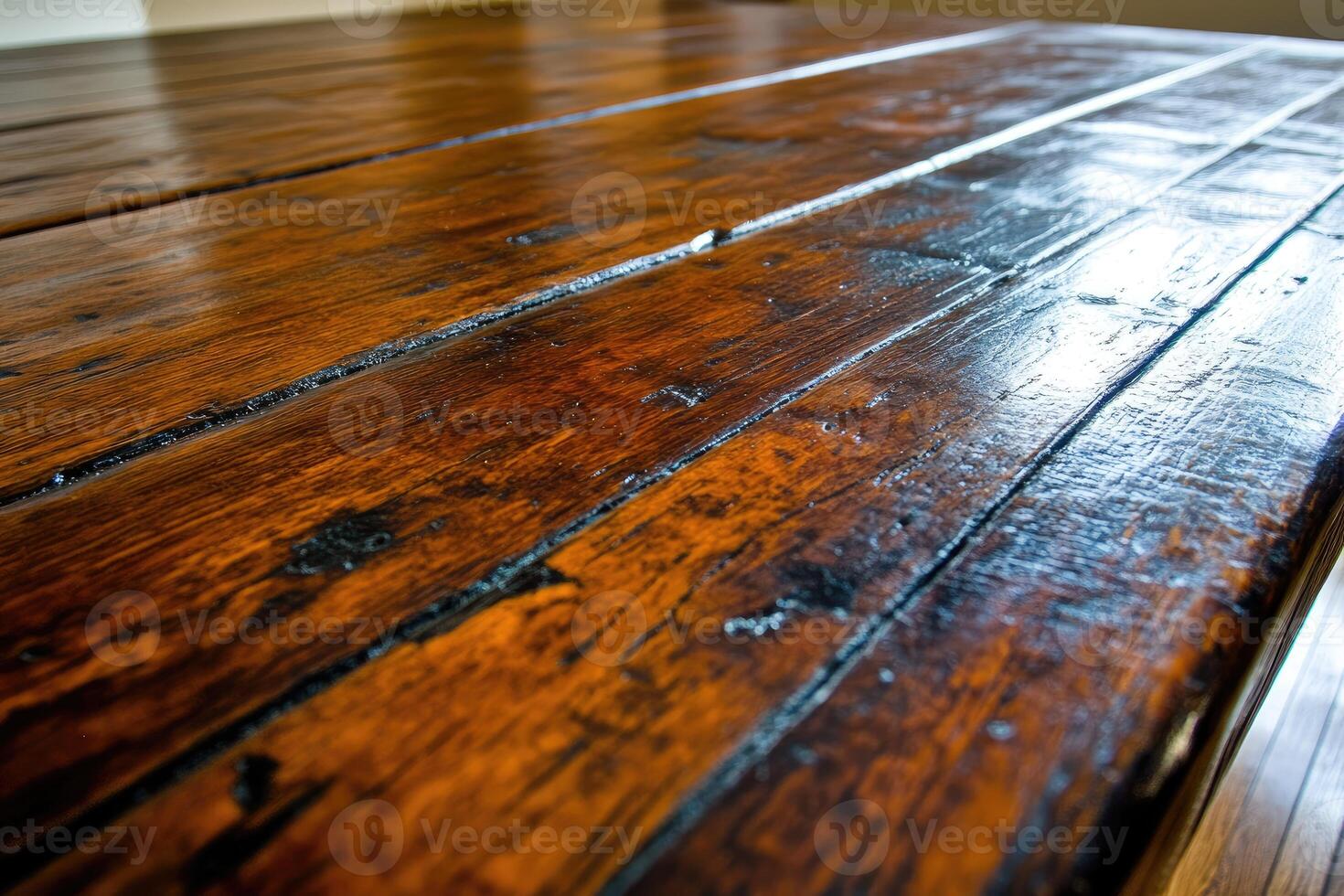 A close up of a wooden table with a black cat on it photo