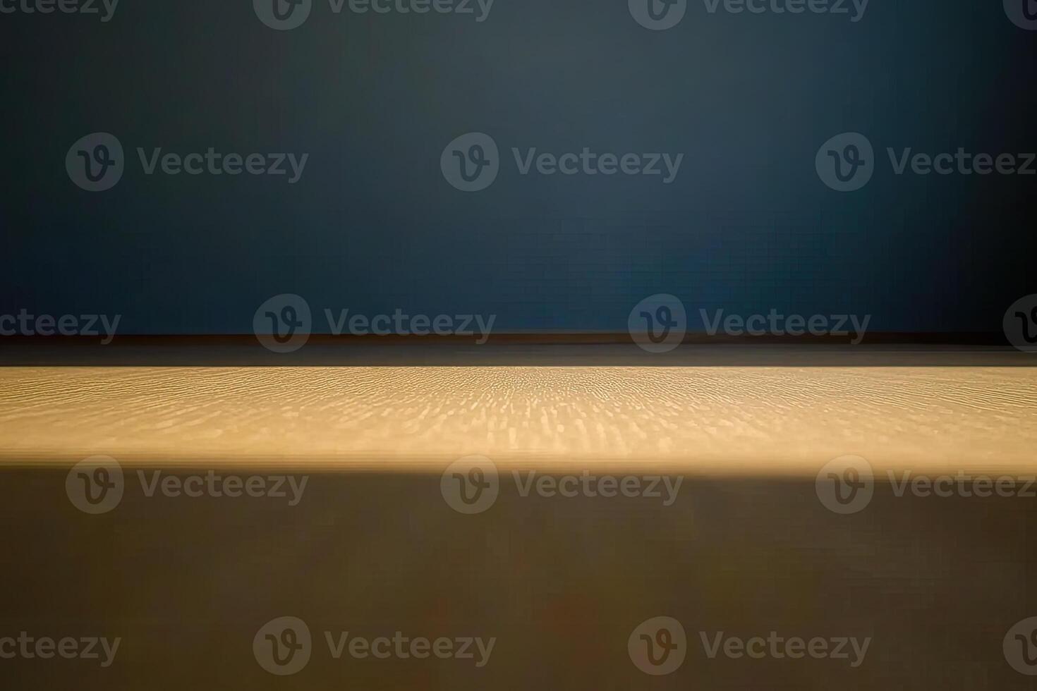 A dark room with a light shining on the floor photo
