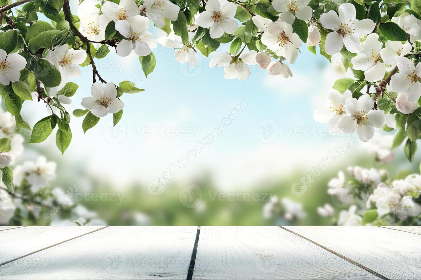 Wooden table with white flowers on a sunny day photo