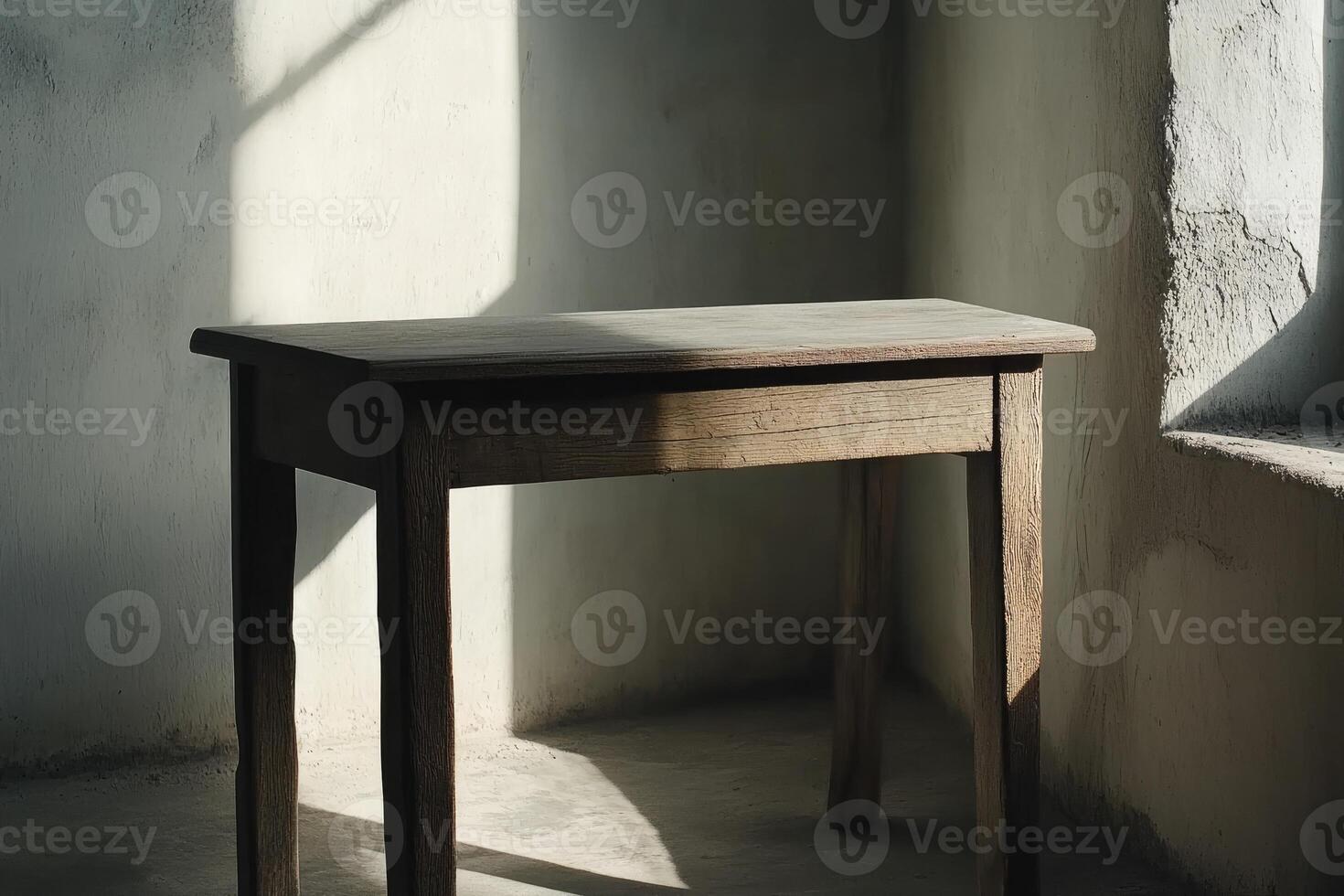 A table in a room with sunlight shining on it photo
