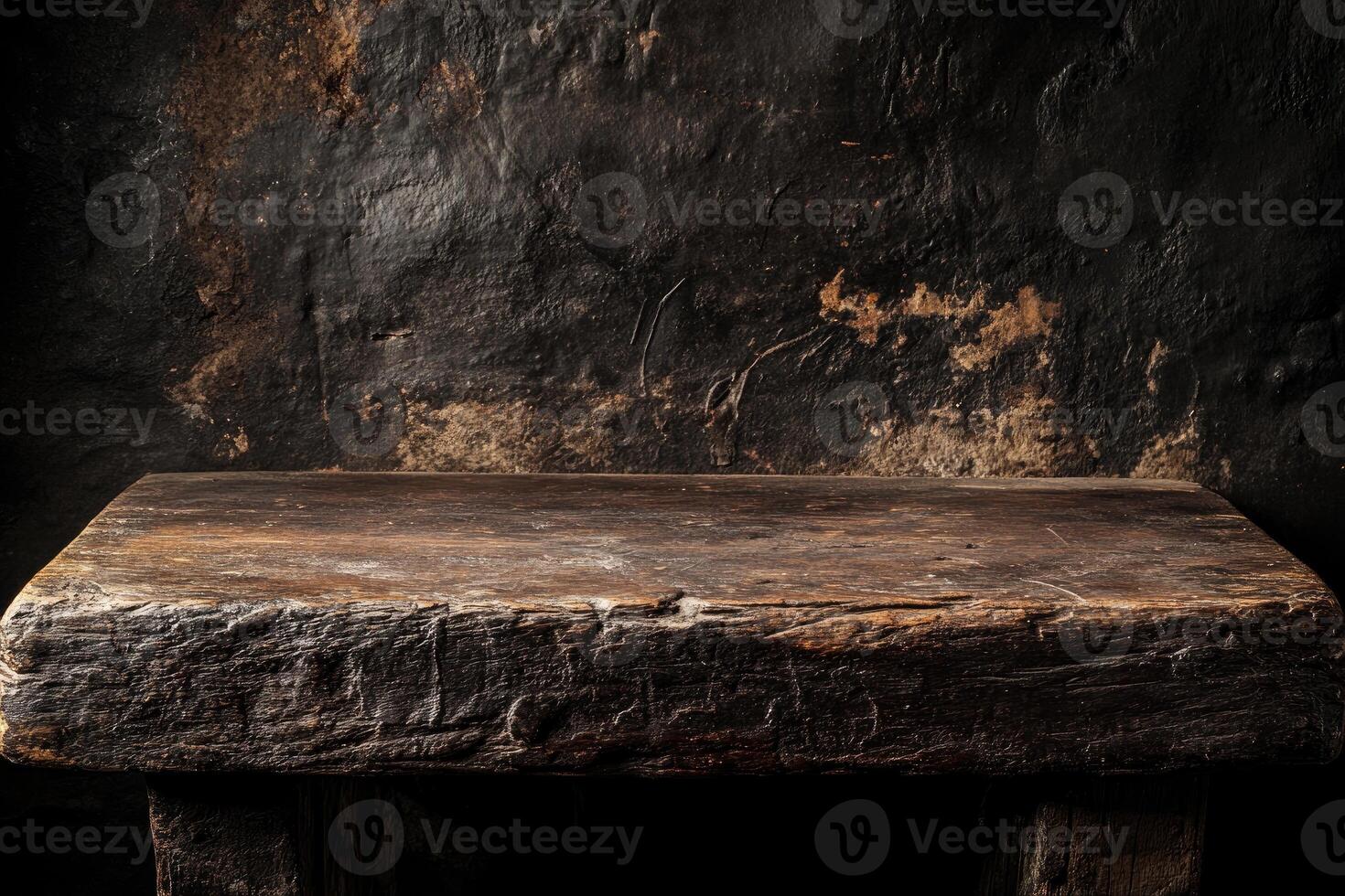 A stone bench sitting in front of a wall photo
