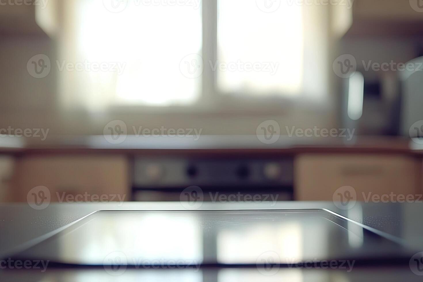 A kitchen counter with a glass top and a window photo